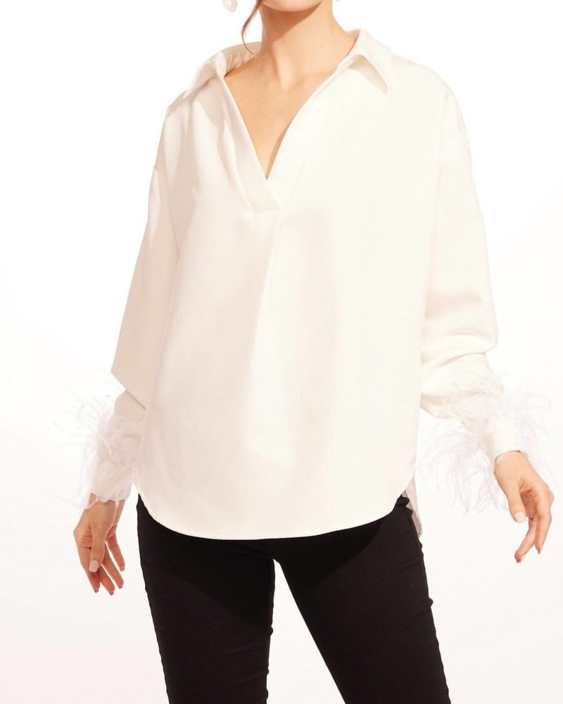 Front of a model wearing a size XL Dolvan Top in White in White by EVA FRANCO. | dia_product_style_image_id:334370